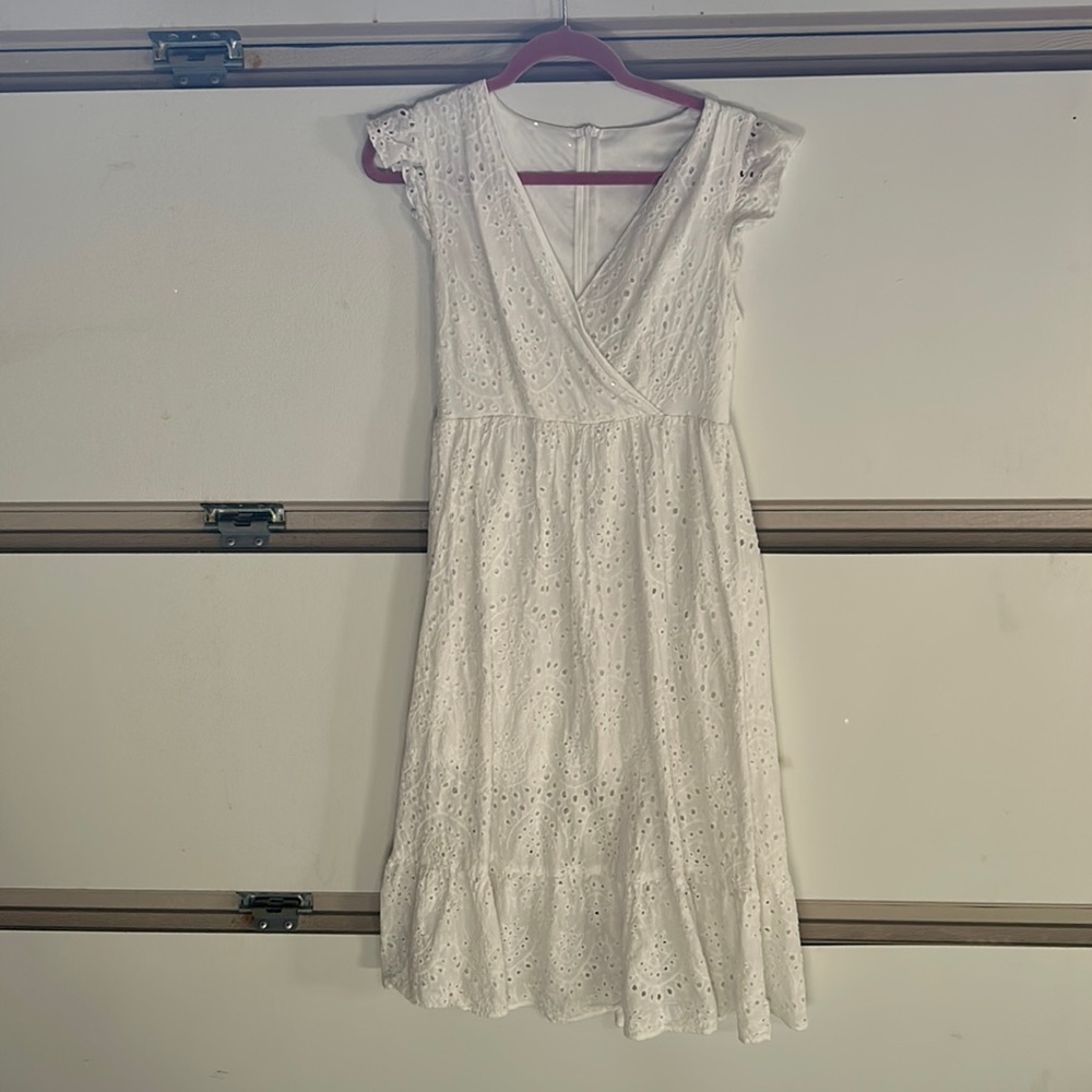 Cute floral white dress knee length. Lightly worn.